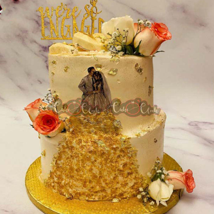 Pink & Golden themed Engagement Cake for the Wedding Couple! Order Eggless Customized  Cake Now - 7000078055 . #CakesnCraft #engagmentcake... | Instagram