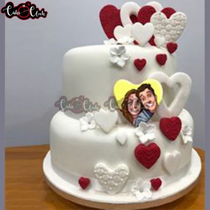 2 tier red and white theme anniversary cake