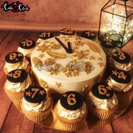 clock theme cake with cupcakes