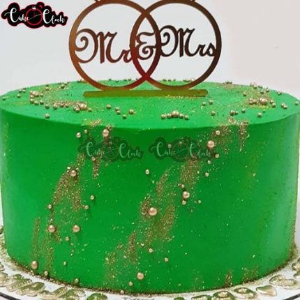 green and golden theme engagement cake