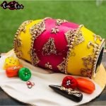 pink and blue mayoon theme cake