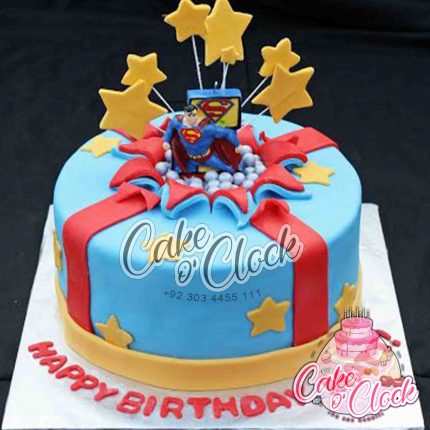 superman busting out of the cake